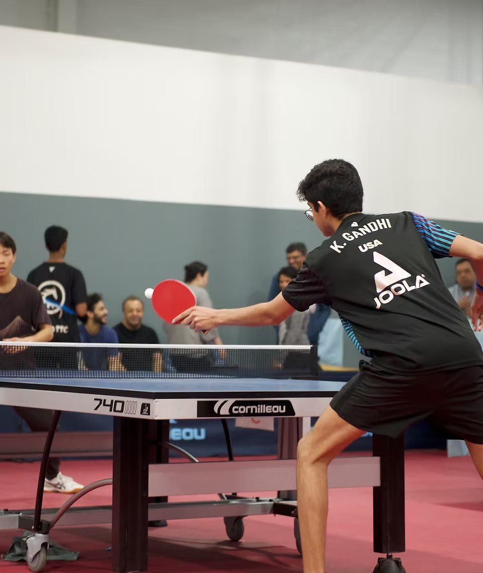 Junior playing a forehand at a Westford TTC tournament